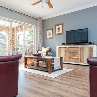 Beautiful laminate installation throughout a warm and cozy Home in Erasmus Kloof.