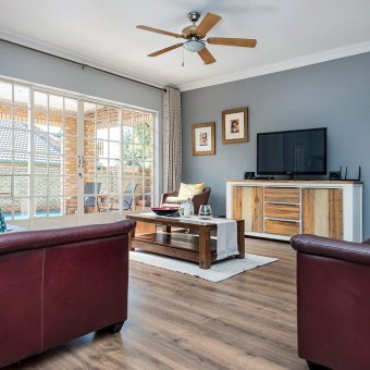 Beautiful laminate installation throughout a warm and cozy Home in Erasmus Kloof.