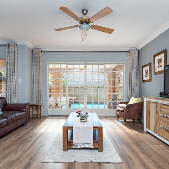 Beautiful laminate installation throughout a warm and cozy Home in Erasmus Kloof.